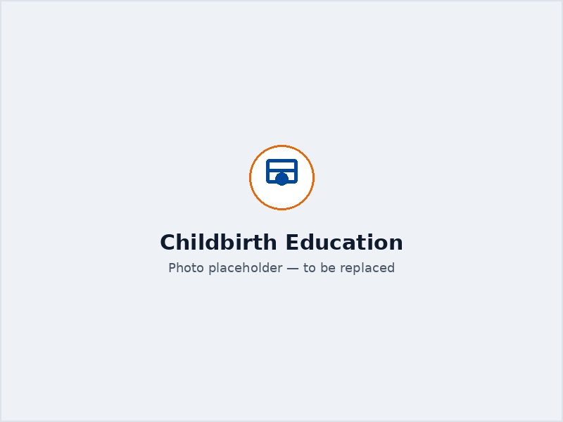 Pregnant woman and partner attending a childbirth education session