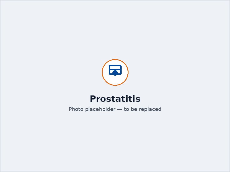 Therapist discussing a treatment plan with a male patient in a private consultation room
